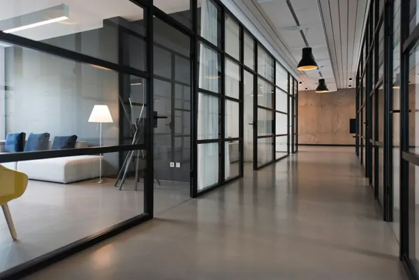 A bright, modern workplace with shared workspaces